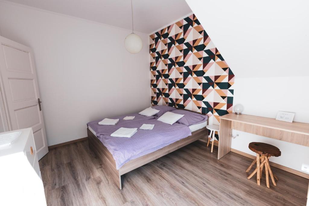 Postel nebo postele na pokoji v ubytování Hilltop Apartments