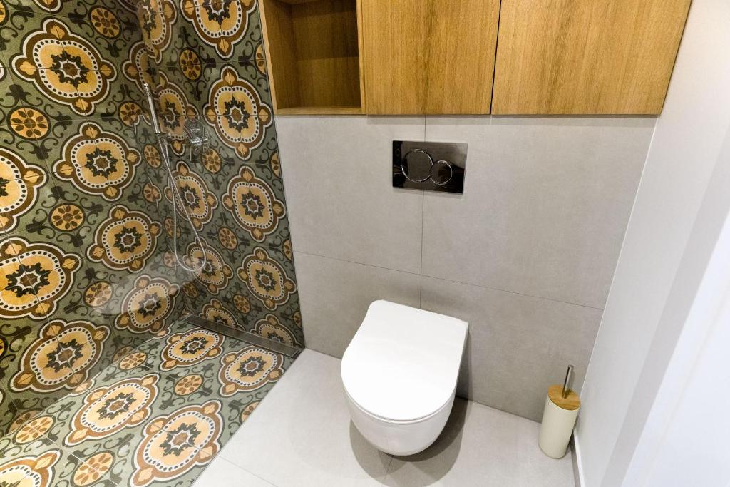 Kúpeľňa v ubytovaní apartamenty Stary Kraków GO
