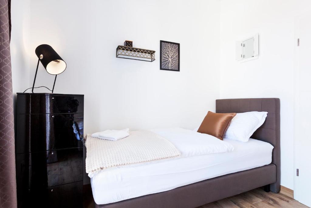 Posteľ alebo postele v izbe v ubytovaní Cozy Apartment Lile in the heart of old town Split