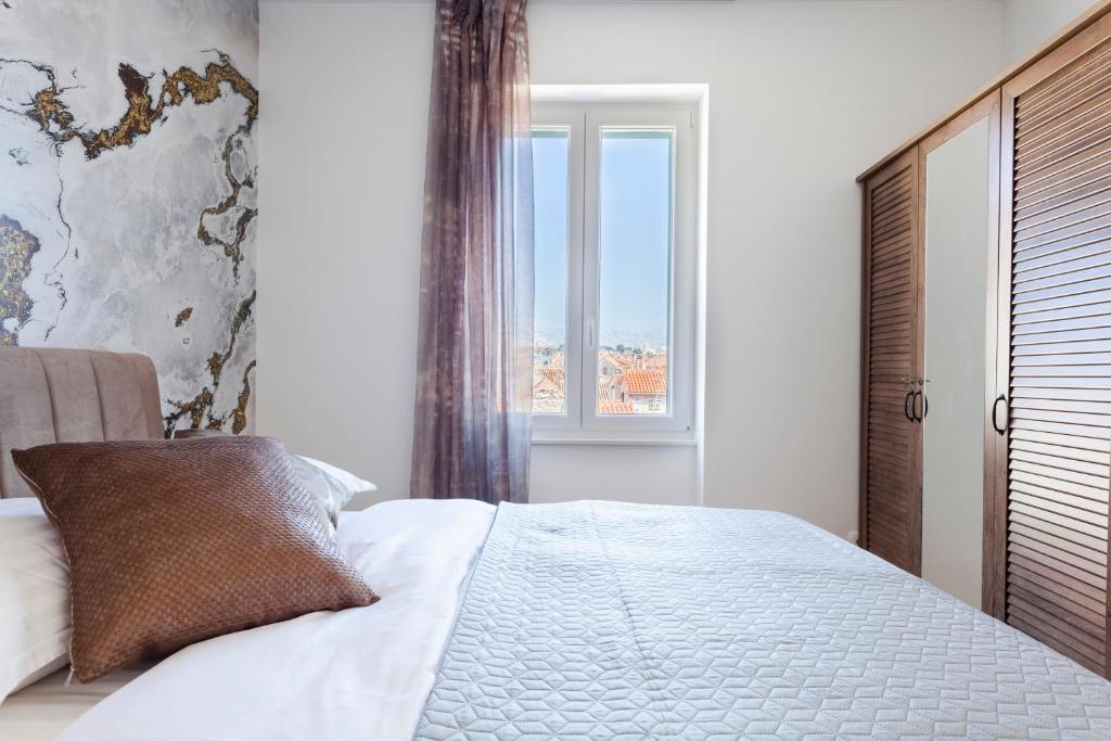 Posteľ alebo postele v izbe v ubytovaní Cozy Apartment Lile in the heart of old town Split