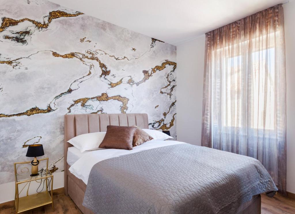 Posteľ alebo postele v izbe v ubytovaní Cozy Apartment Lile in the heart of old town Split