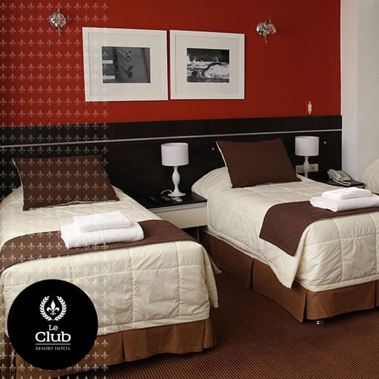 Postel nebo postele na pokoji v ubytování leclub resort hotel