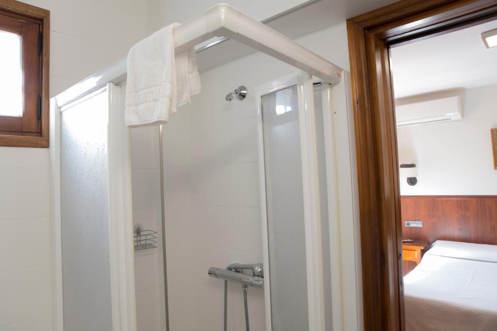 Postel nebo postele na pokoji v ubytování Hotel Santa Isabel