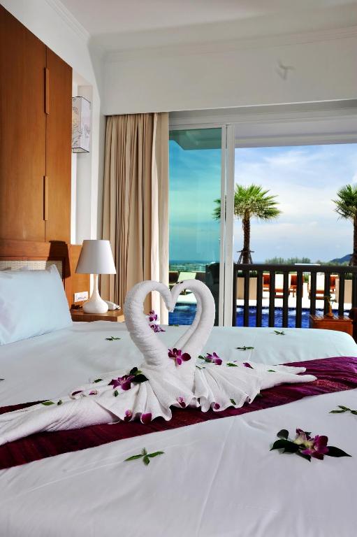 Postel nebo postele na pokoji v ubytování Princess Seaview Resort & Spa - SHA Plus