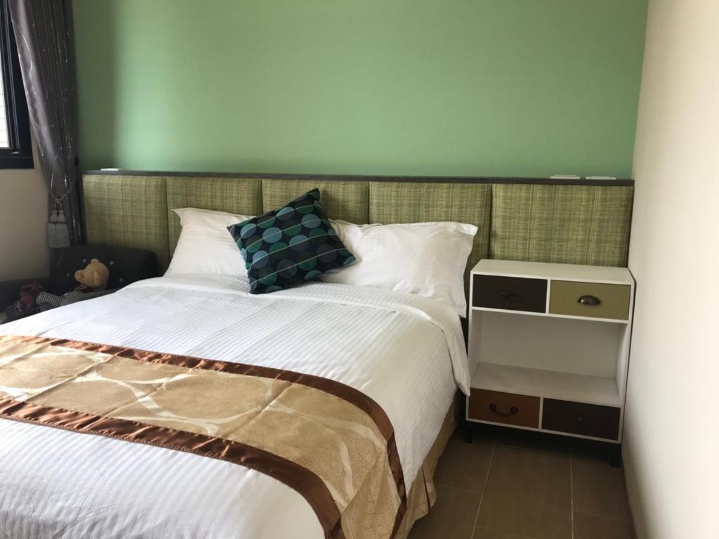 Postel nebo postele na pokoji v ubytování Good Nest Homestay