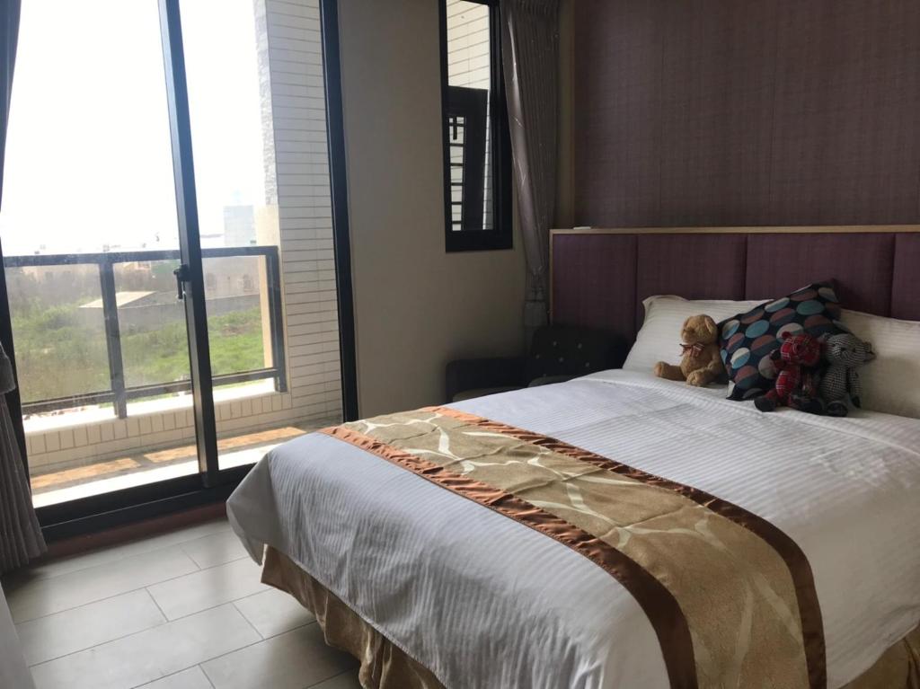 Postel nebo postele na pokoji v ubytování Good Nest Homestay