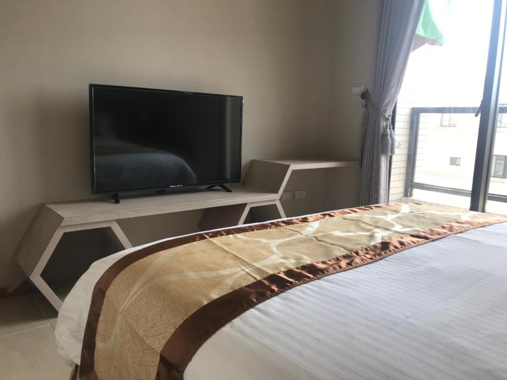 TV a/nebo společenská místnost v ubytování Good Nest Homestay