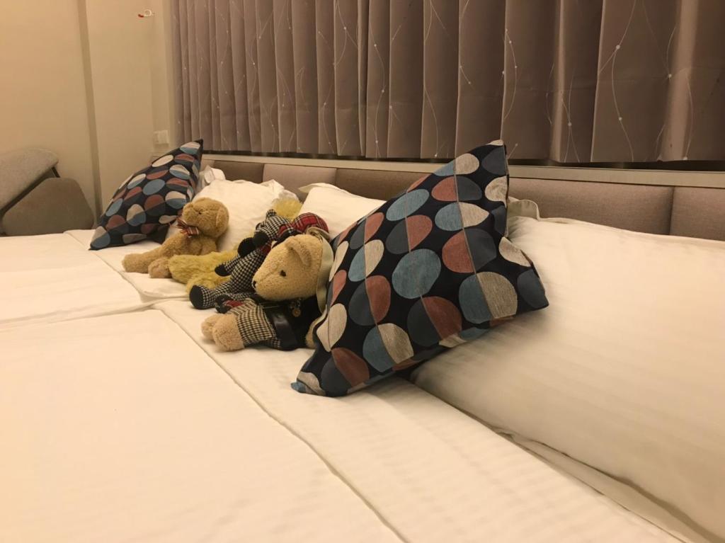 Postel nebo postele na pokoji v ubytování Good Nest Homestay