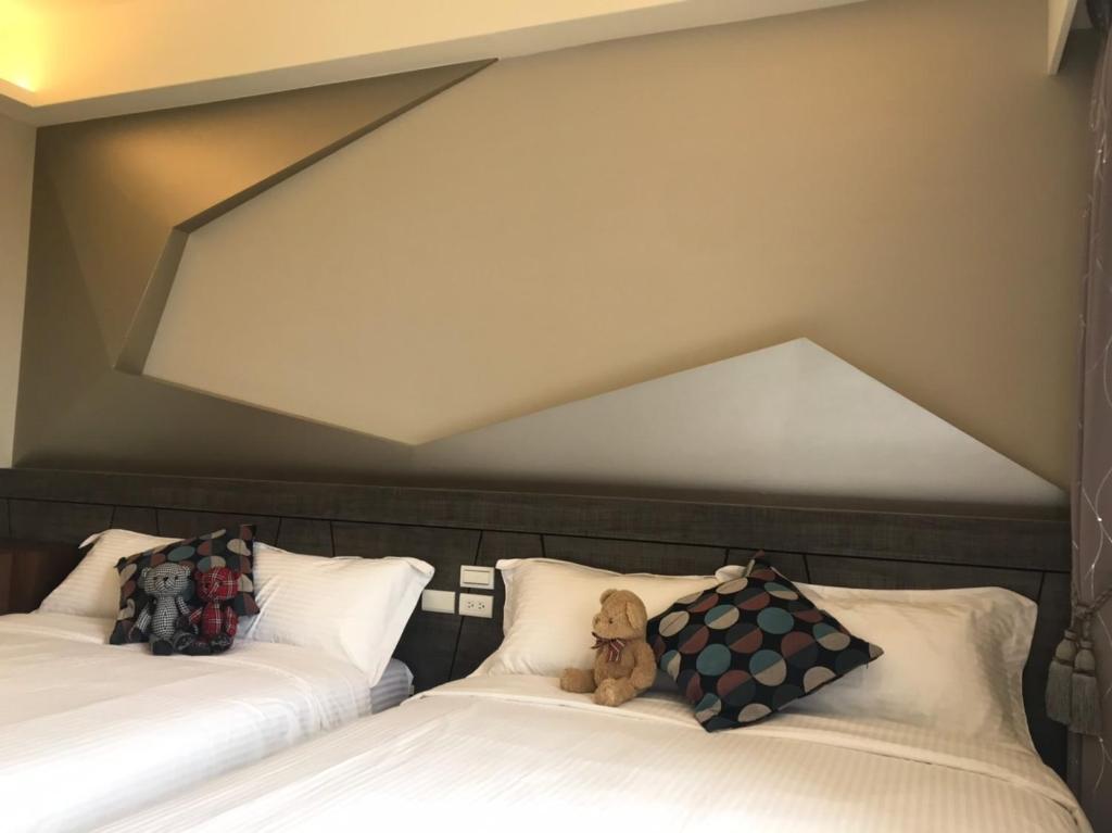 Postel nebo postele na pokoji v ubytování Good Nest Homestay