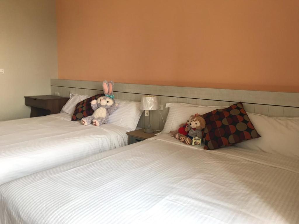 Postel nebo postele na pokoji v ubytování Good Nest Homestay
