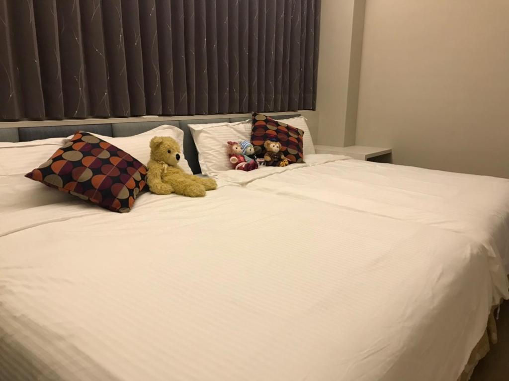 Postel nebo postele na pokoji v ubytování Good Nest Homestay