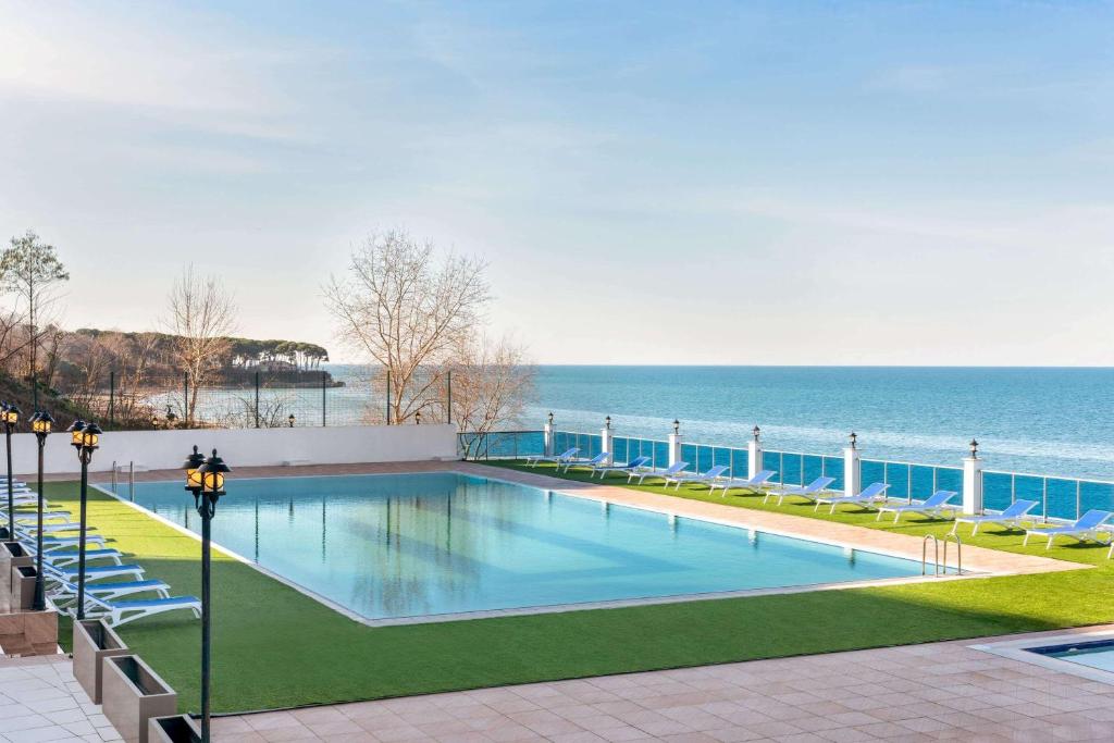 The swimming pool at or close to Ramada Resort by Wyndham Unye