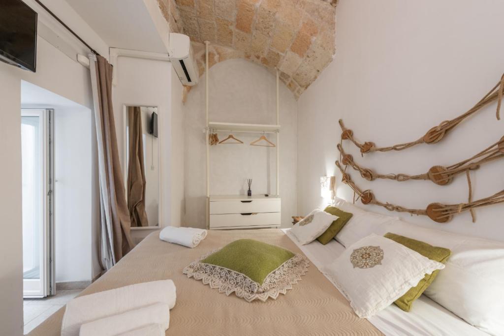 Postel nebo postele na pokoji v ubytování Eremo Guest House - Housea
