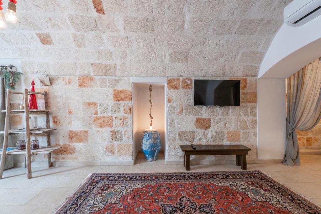 TV a/nebo společenská místnost v ubytování Eremo Guest House - Housea