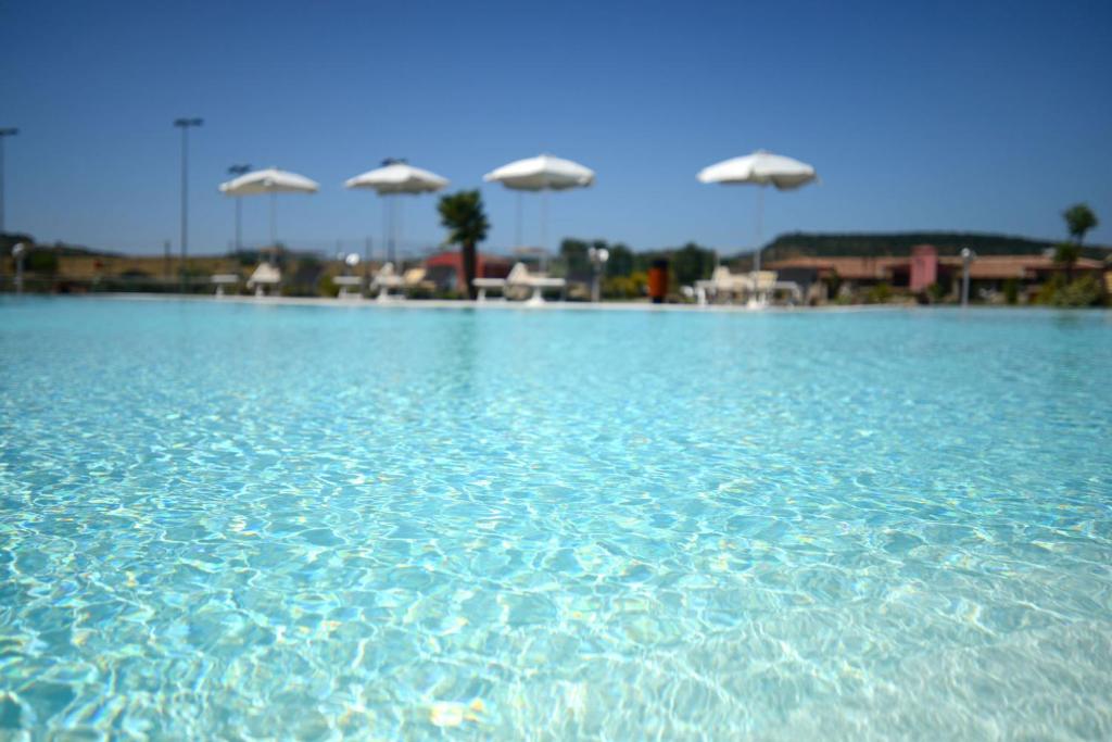 Bazén v ubytování Hotel Sa Cheya Relais & Spa nebo v jeho okolí