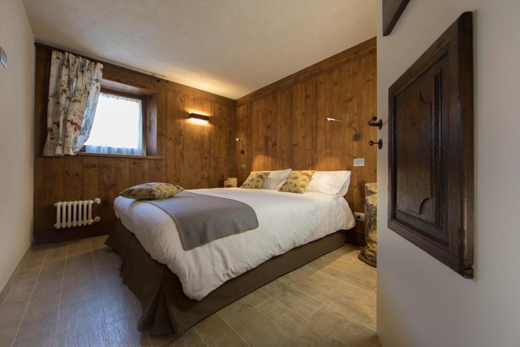 Postel nebo postele na pokoji v ubytování Maison Lo Triolet