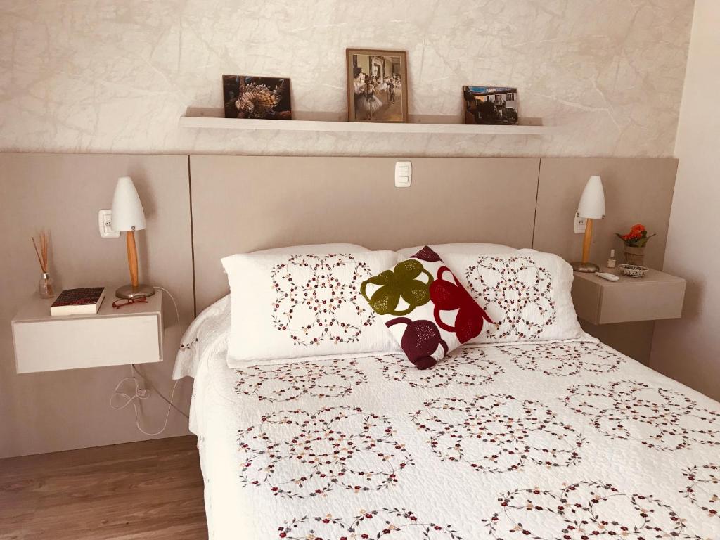 Cama ou camas em um quarto em Cantinho dos Miró’s
