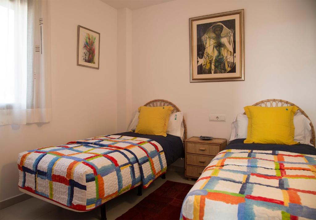 Postel nebo postele na pokoji v ubytování Villas Medes Mar - Plus Costa Brava