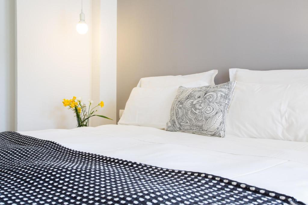 Postel nebo postele na pokoji v ubytování Hotel Solemare
