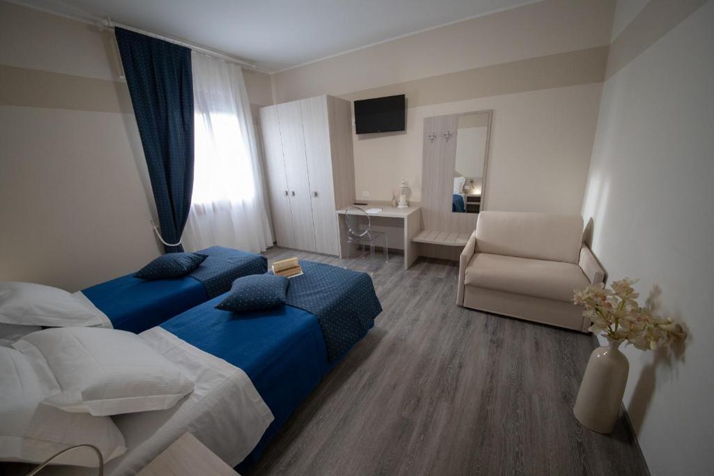 Posezení v ubytování HOME HOTEL