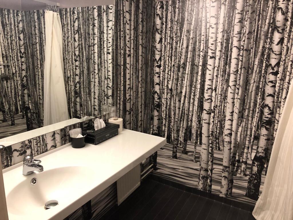 Koupelna v ubytování Hotell Smedjan