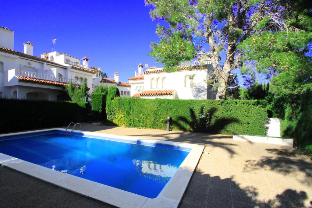 Swimmingpoolen hos eller tæt på ARENDA Casa Bedoll 1