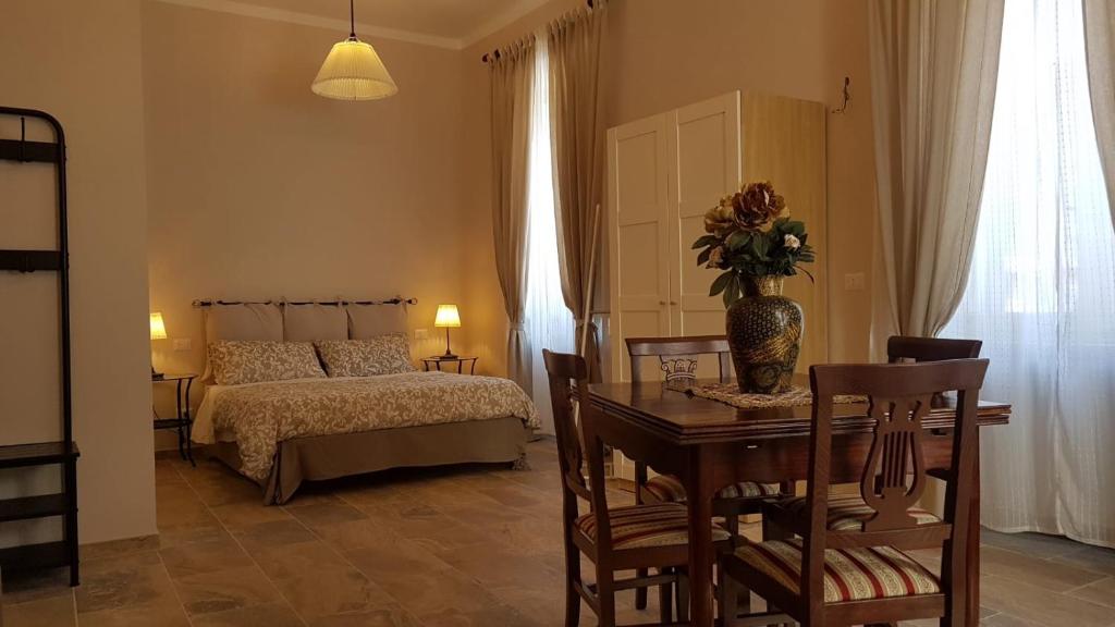 A bed or beds in a room at La Salita B&B