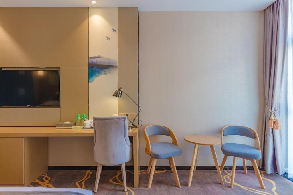 TV a/nebo společenská místnost v ubytování Taishan He Style Hotel