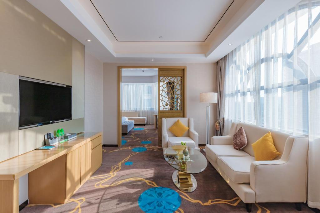 TV a/nebo společenská místnost v ubytování Taishan He Style Hotel