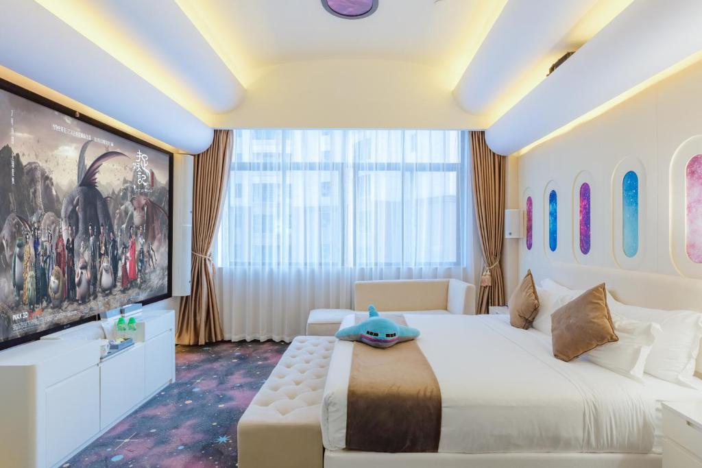 Postel nebo postele na pokoji v ubytování Taishan He Style Hotel