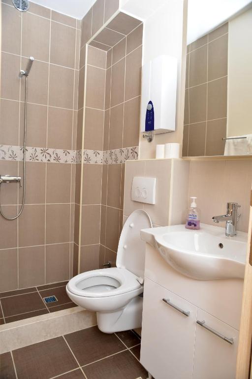 Koupelna v ubytování Apartments Mianiko