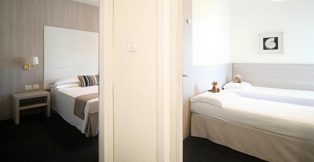 Postel nebo postele na pokoji v ubytování Hotel Atlantico