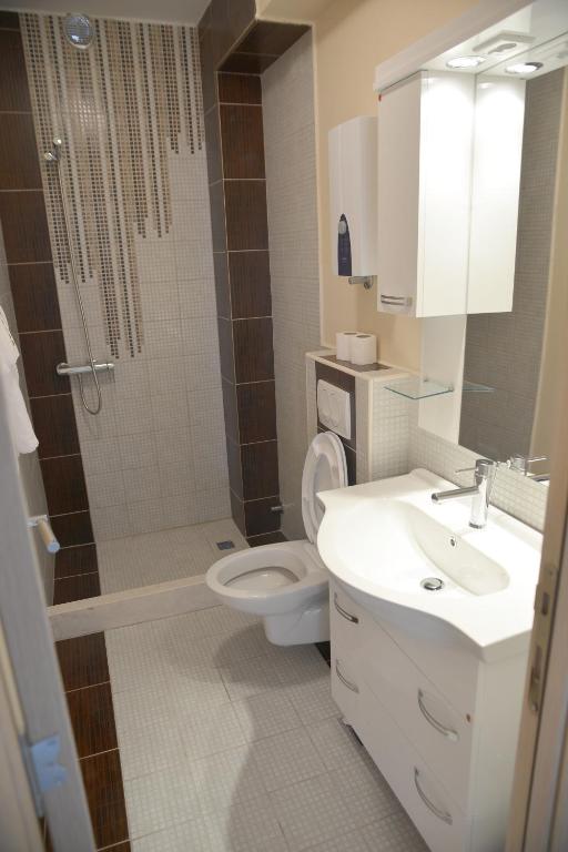 Koupelna v ubytování Apartments Mianiko