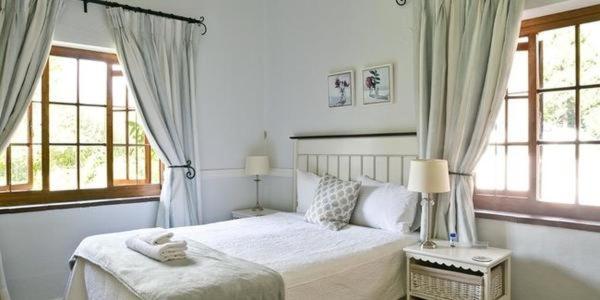 Letto o letti in una camera di Grace Guest House