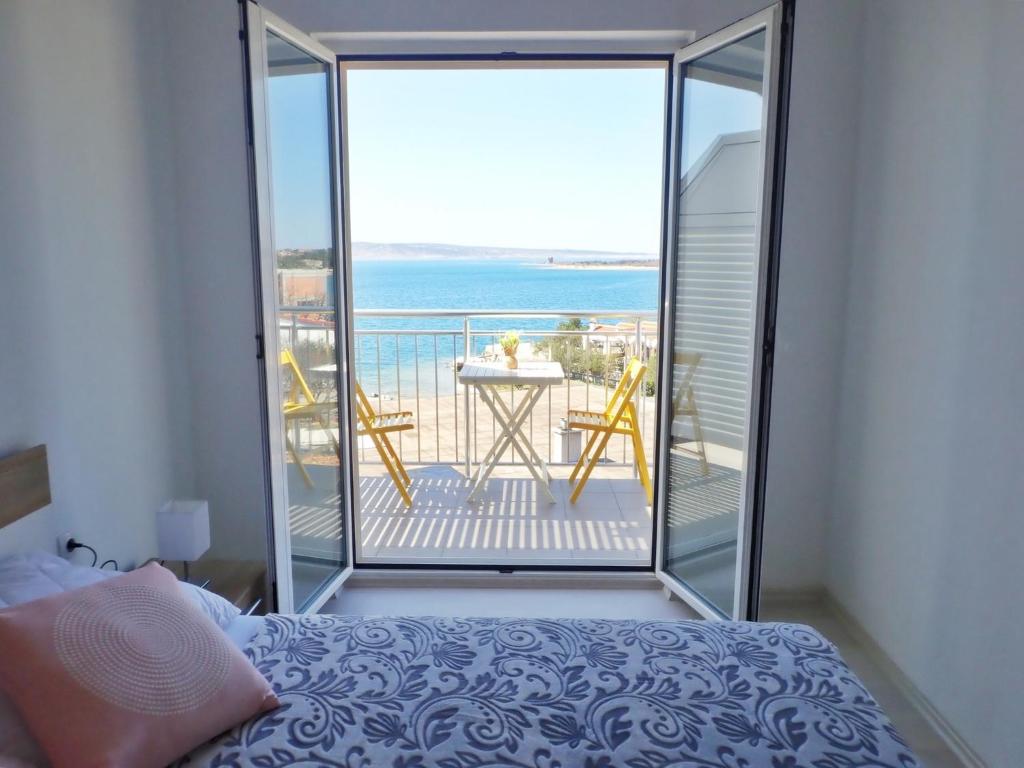 Posteľ alebo postele v izbe v ubytovaní Apartment ELA enjoy breathtaking seaview