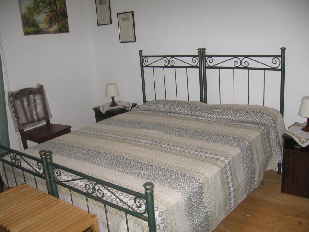 Postel nebo postele na pokoji v ubytování B&B Domus Gaetani