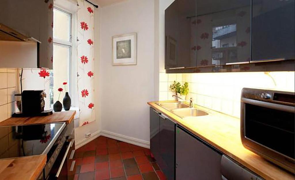 Kuchyň nebo kuchyňský kout v ubytování Nordic Host - Deichmans Gate 10