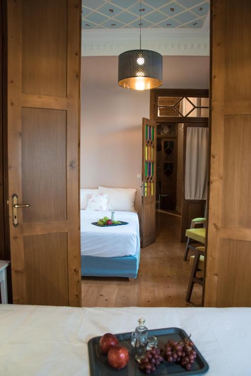 Posteľ alebo postele v izbe v ubytovaní Porta Medina Boutique Hotel