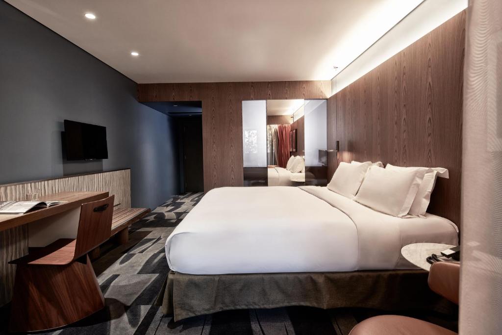 Postel nebo postele na pokoji v ubytování AthensWas Design Hotel