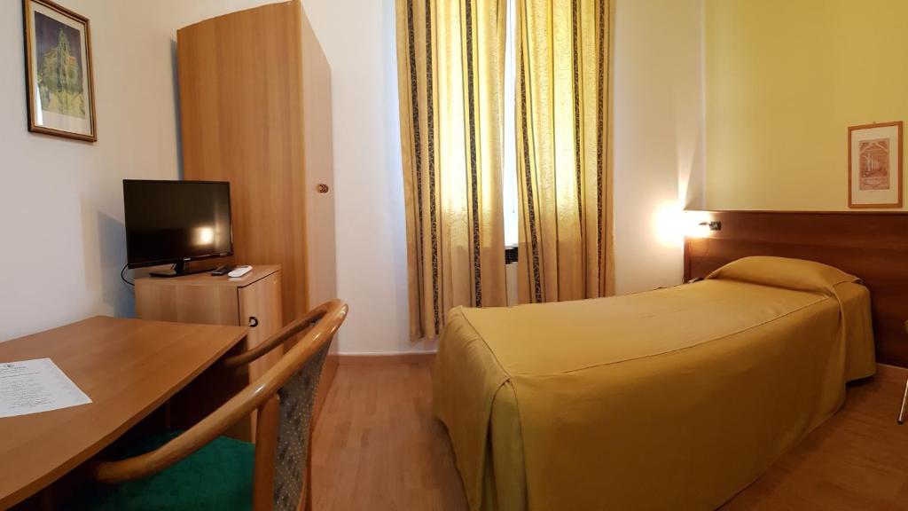 Posteľ alebo postele v izbe v ubytovaní Hotel Terme di Castel San Pietro