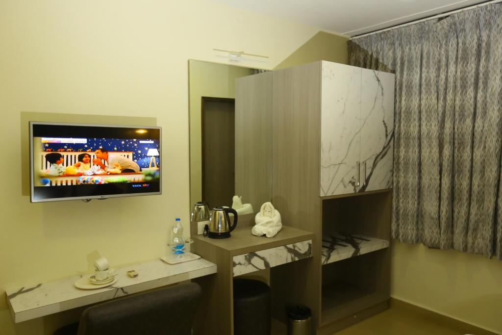 TV a/nebo společenská místnost v ubytování HOTEL KEK GRAND PARK