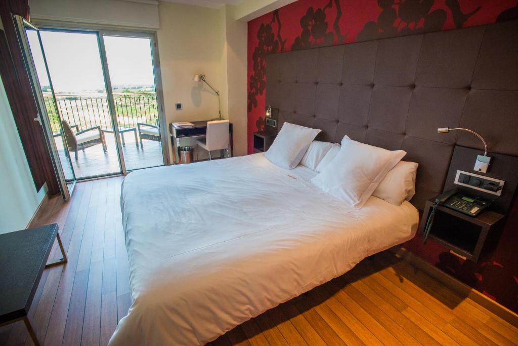 Postel nebo postele na pokoji v ubytování Hotel Eguren Ugarte