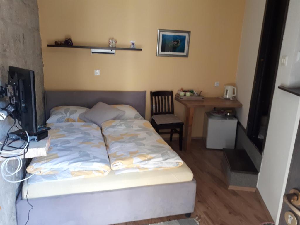Postel nebo postele na pokoji v ubytování Elena Rooms