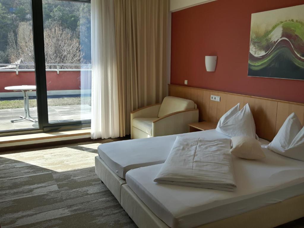 Posteľ alebo postele v izbe v ubytovaní Hotel Bokan Exclusiv
