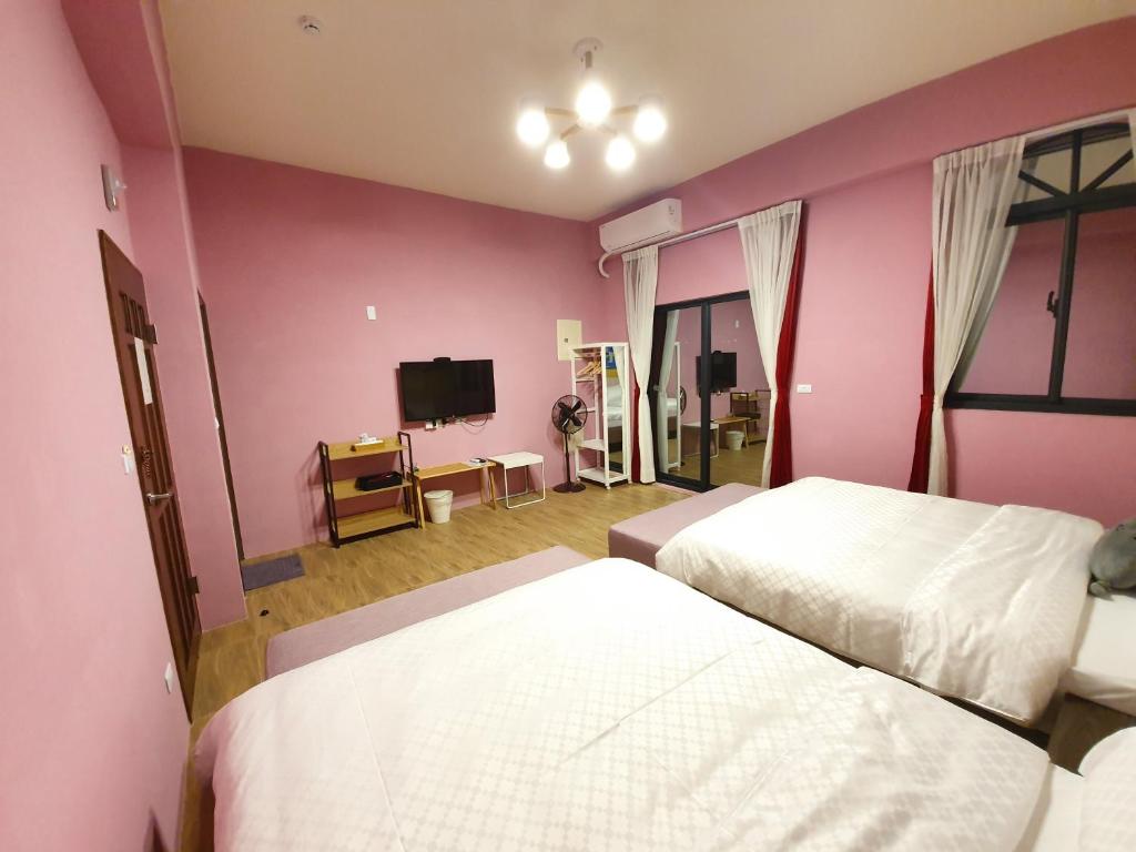 Postel nebo postele na pokoji v ubytování MOYA Homestay