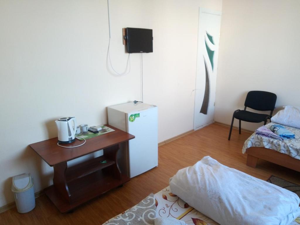 TV a/nebo společenská místnost v ubytování Hotel Uyut