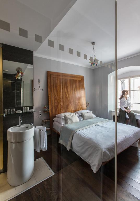 Postel nebo postele na pokoji v ubytování Design Hotel Neruda
