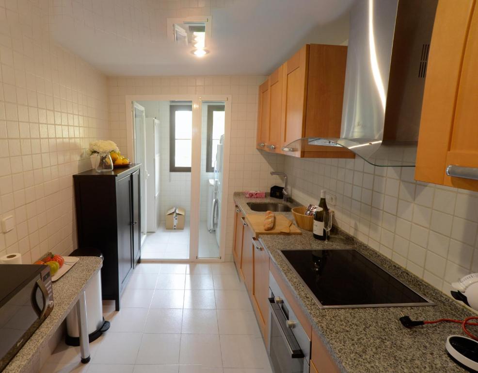 Kuchyň nebo kuchyňský kout v ubytování Penthouse Karina Los Arqueros
