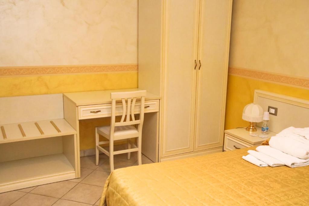 Postel nebo postele na pokoji v ubytování b&b DOREMI