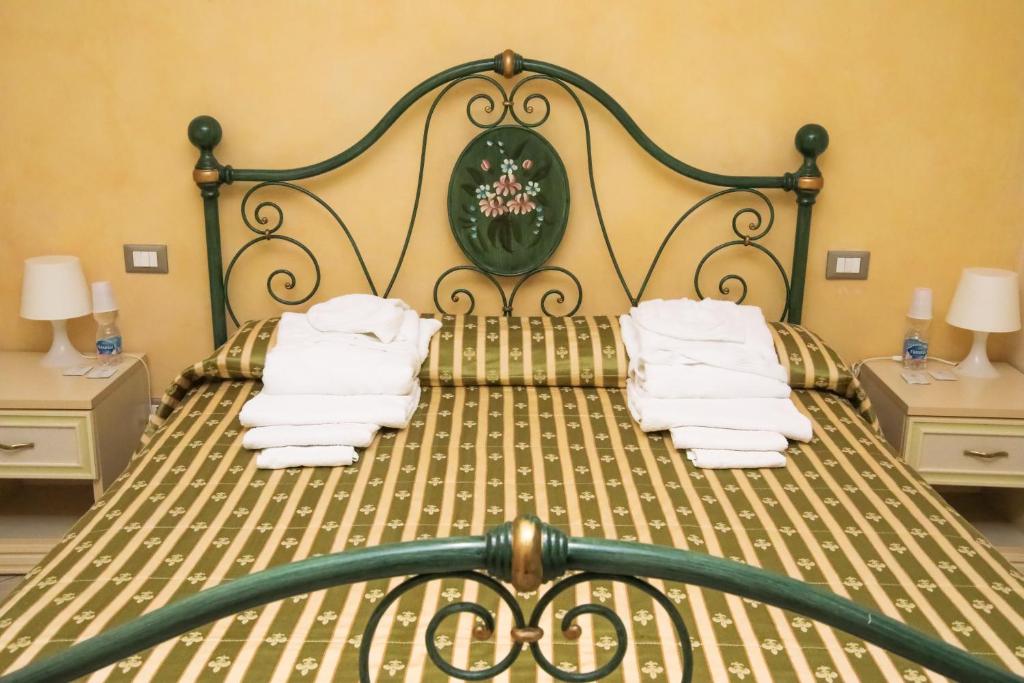 Postel nebo postele na pokoji v ubytování b&b DOREMI